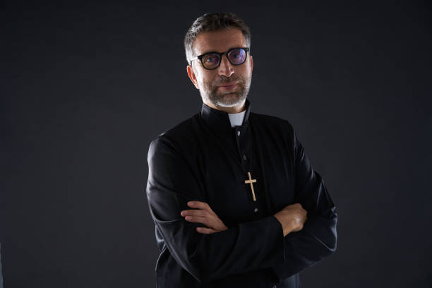 istock Crossed arms priest portrait senior 1059522258