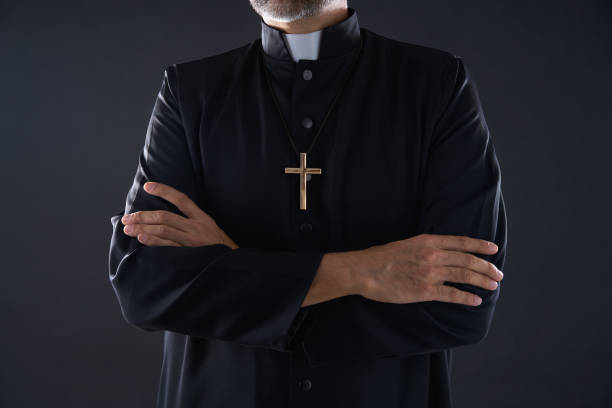 istock Crossed arms priest portrait senior 1059522264