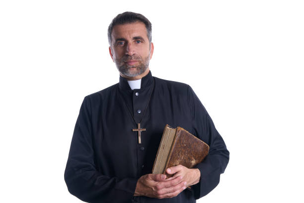 istock Priest portrait with Holy Bible in hands 1059522300