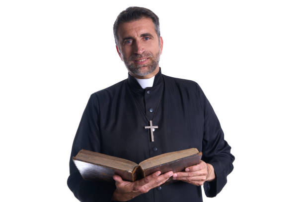 istock Priest portrait with Holy Bible in hands 1059522304