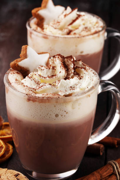 istock Hot chocolate cocoa with whipped cream on table. 1059524606