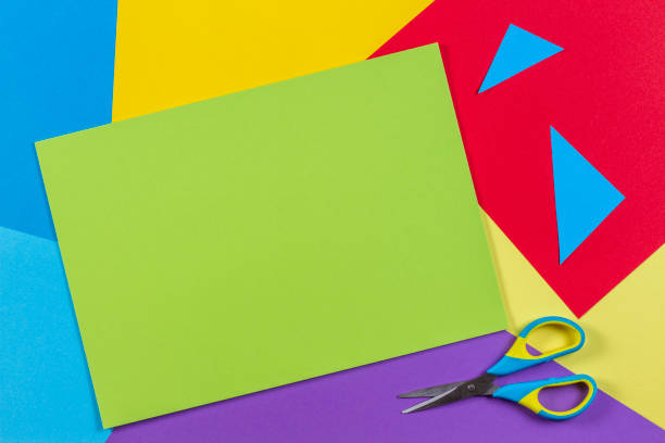 top view of colored paper with colorful scissors. kids art and craft paper applique background - modelo arte e artesanato ilustrações imagens e fotografias de stock