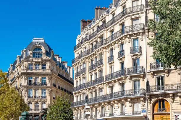 Paris, beautiful buildings boulevard des Batignolles, typical parisian facade