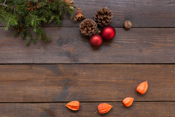 istock Christmas background Christmas tree and gifts nuts cones 1059537988