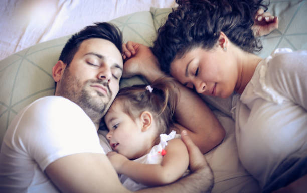 istock She won't be leaving their bed soon. 1059538704
