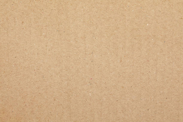 istock cardboard sheet abstract background, texture of brown paper box for design art work, old vintage paper for background. 1059543444