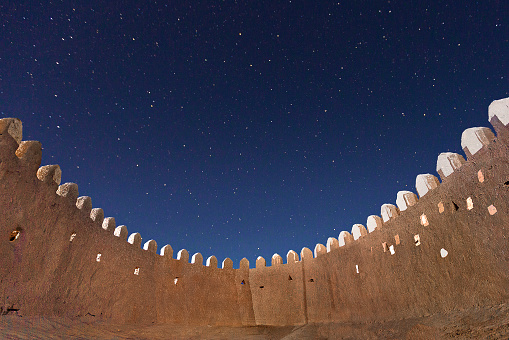 Historical city walls with stars in the sky, in Khiva, Uzbekistan
