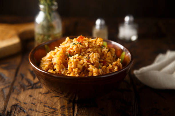 Rice with vegetables Fried rice with spices and vegetables red chicken stock pictures, royalty-free photos & images