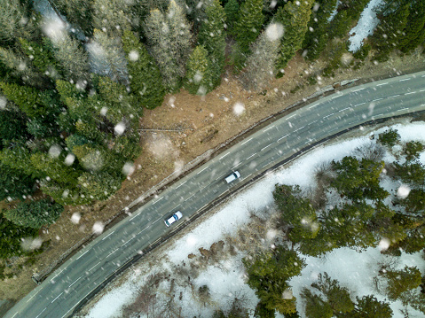 Aerial View Of A Road In Winter Forest