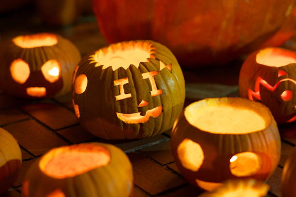 istock Jack-o'-lanterns or Halloween pumpkin carving lanterns 1059553328