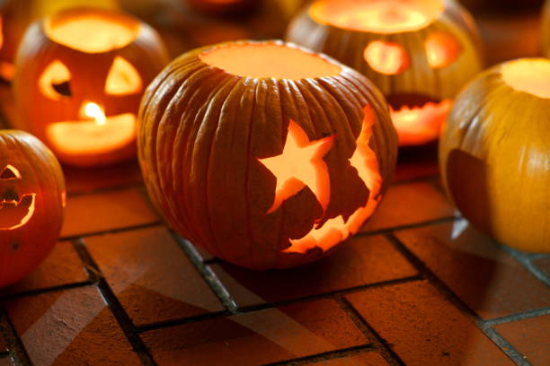 istock Jack-o'-lanterns or Halloween pumpkin carving lanterns 1059553336