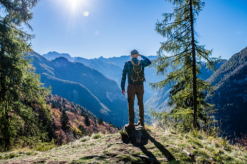 Young Adult Man Hiking In Autumn, Julian Alps, Vršič, Slovenia, Europe.
