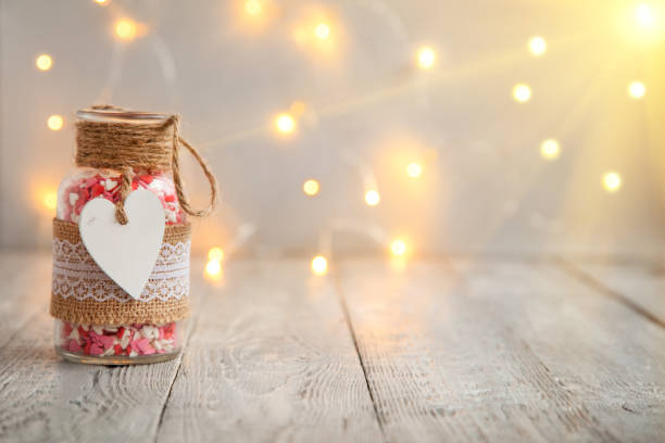 istock sugar candy hearts in a decoration bottle on wooden board 1059554754
