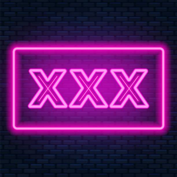 istock XXX neon sign on a dark background. 1059555176