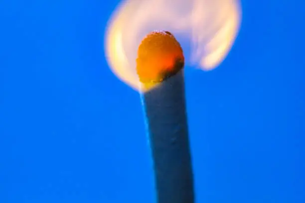 hunting burning match on a blue background
