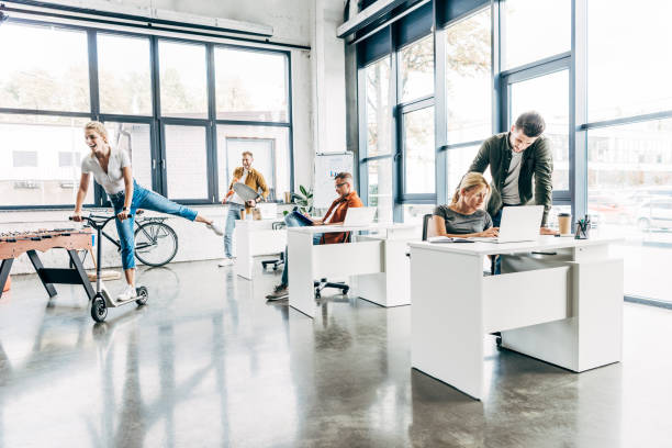 istock group of happy progressive entrepreneurs working on startup together at modern open space office 1059568816