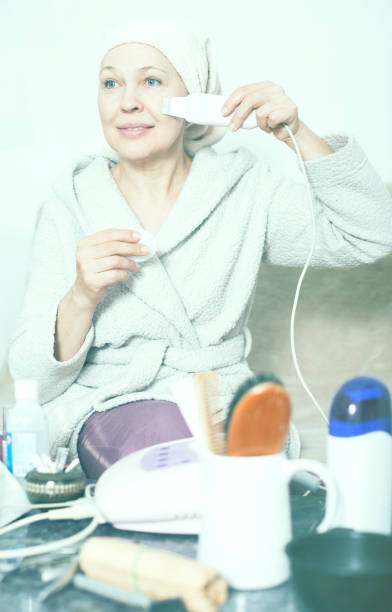 istock Woman doing ultrasonic cleaning 1059571168