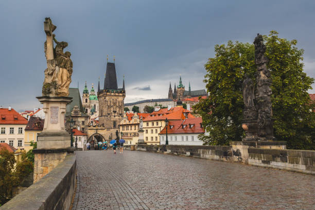 istock Over the Charles bridge, Prague, in a rainy morning 1059571616