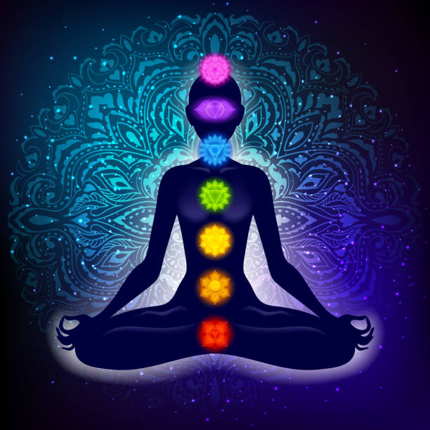 Meditating woman in lotus pose. Yoga illustration. Meditating woman in lotus pose. Yoga illustration. Colorful 7 chakras and aura glow. Mandala background. chakra stock illustrations