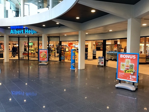 Dordrecht, the Netherlands - October 20, 2018:  Grocery shop entrance Albert Heijn Dordrecht. Albert Heijn or AH, is the largest supermarket chain in the Netherlands.