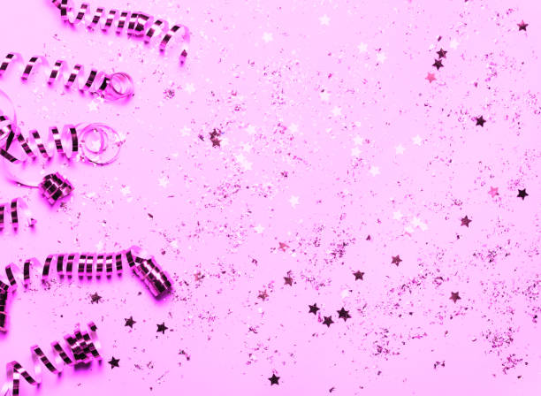 istock Pink and violet festive confetti background. Bright background for celebration birthday. 1059595722