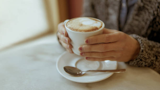 istock Woman with hot coffee 1059597206