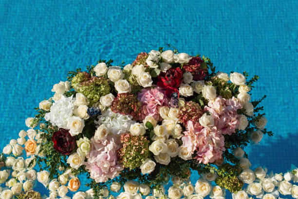 istock The pool filled with white rose flowers. Wedding decor 1059599684