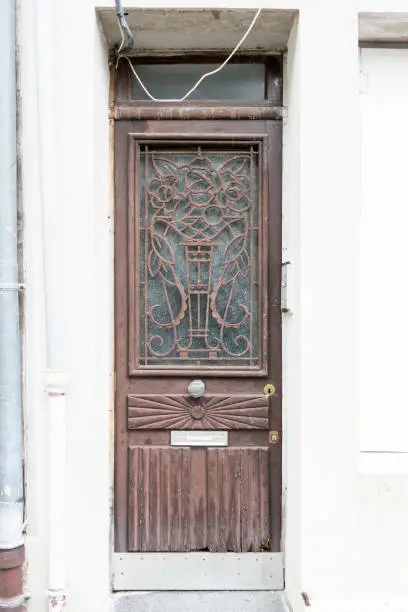 Art-deco door in the town of Honfleur, France