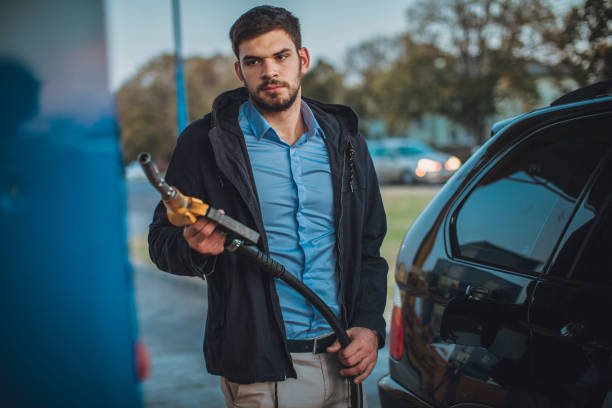 istock Man at the gas station 1059606302