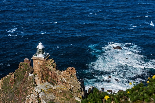 Lighthouse Cape of Good hope and  blue ocean on the background. South Africa.