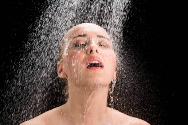istock Woman taking shower 1059610336