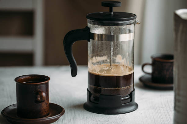 istock French Press Coffee Maker. Morning concept 1059610758