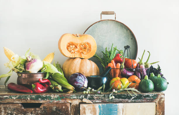 istock Fall vegetarian food ingredients variety on rustic cupboard 1059625676