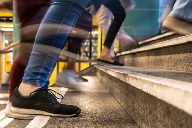 istock Low Section Of Man Walking On Staircase 1059632250