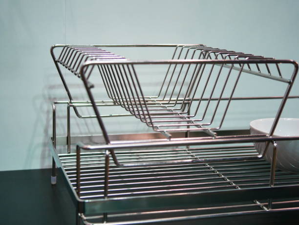 istock Stainless steel self on wall tiles 1059644368