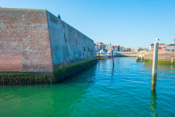istock Ancient seaport in sunlight below a blue sky at fall 1059644434