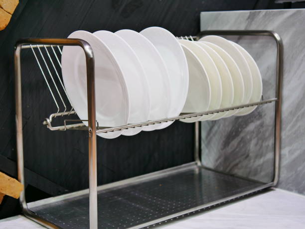 istock Row of stainless pot on a shelf 1059647376