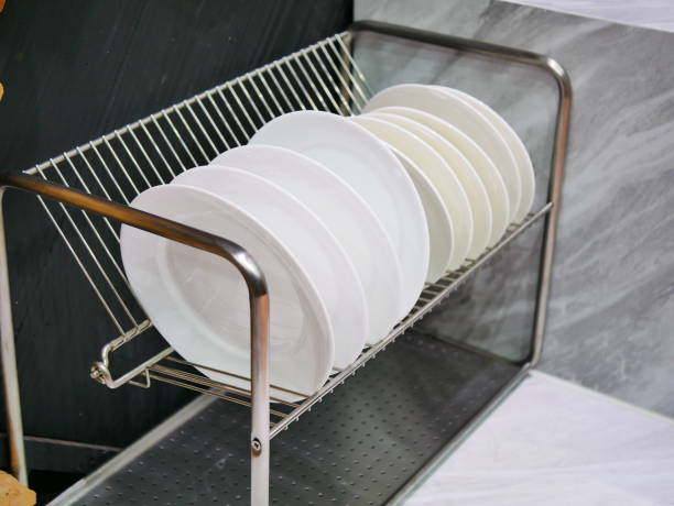 istock Row of stainless pot on a shelf 1059647570