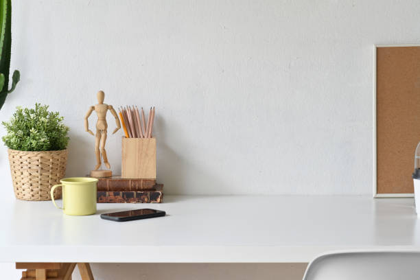 istock White workspace and copy space with home office supplies. 1059648590