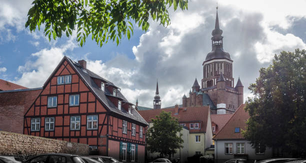 View of St Mary's church tower with houses in the foreground