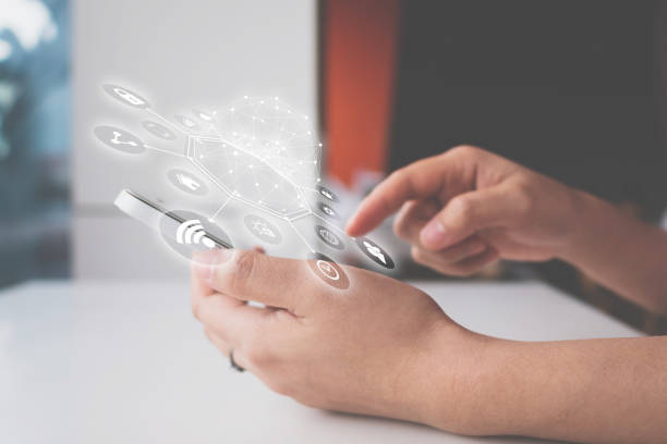 Woman hand using smartphone with icon technology communication and internet of things (IOT). Innovative convenience smart life concept