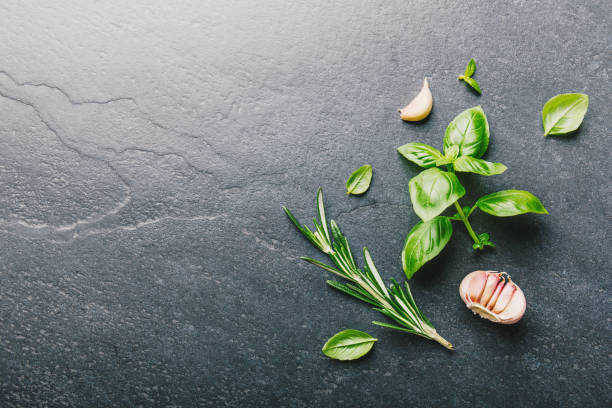 istock Ingredients for cooking placed on dark background. 1059654442