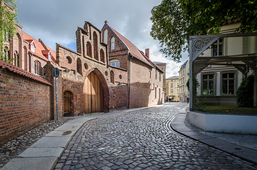 Cobbled street leading to the German Oceanographic Museum, formerly St Chatherine's Abbey