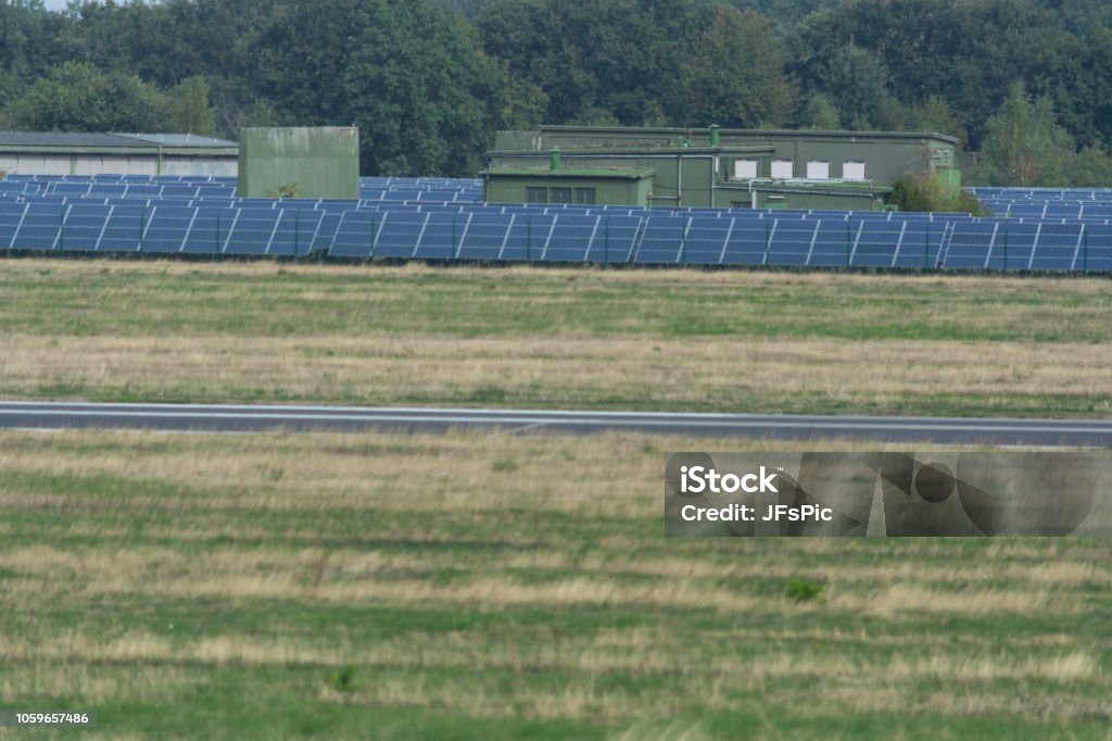 Solar system of Weeze Airport. Panorama of the solar system of Weeze Airport.
The airport uses huge solar parks to cover its own energy consumption. Aerial View Stock Photo