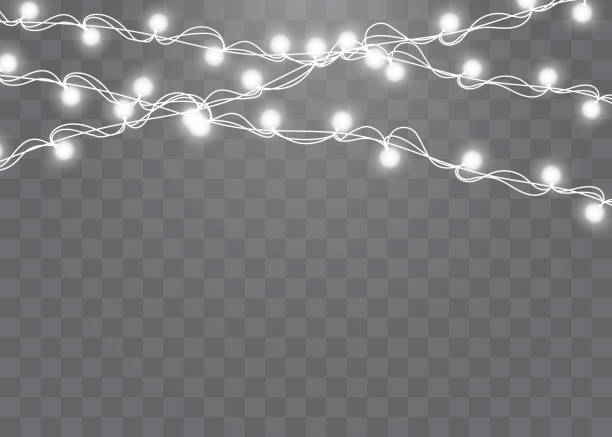 istock Christmas lights isolated realistic design elements. Glowing lights for Xmas Holiday cards, banners, posters, web design. Garlands decorations 1059661700