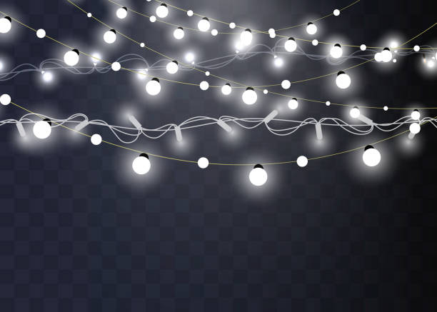 istock Christmas lights isolated realistic design elements. Glowing lights for Xmas Holiday cards, banners, posters, web design. Garlands decorations 1059661790