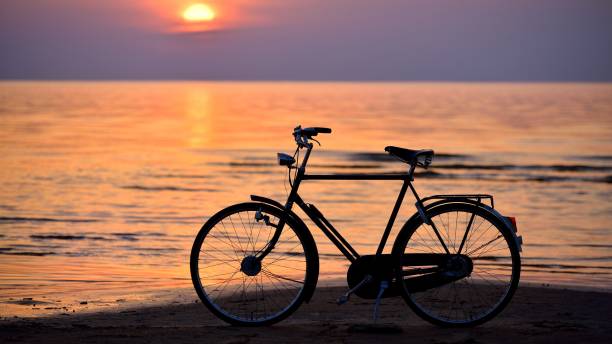 istock Bicycle on the Baltic seacoast at sunset 1059663824