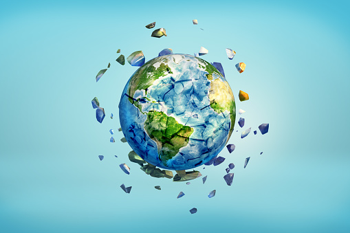 3d rendering of Earth globe getting crushed into small pieces with the cracked parts flying away. End of Earth. Environment crisis. We lose our planet. Elements of this image are furnished by NASA (http://visibleearth.nasa.gov/)