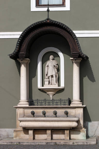 istock fountain and Saint Istvan sculpture Eger Hungary 1059680168