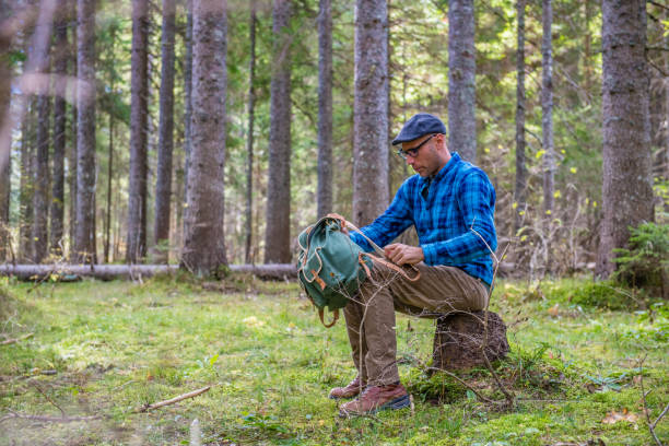 istock Young Adult Man taking a Rest in the Forest 1059680824